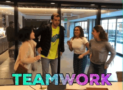 Animated GIF of four people doing a high five and saying teamwork