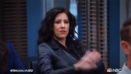 Animated GIF of two people exchanging a high five