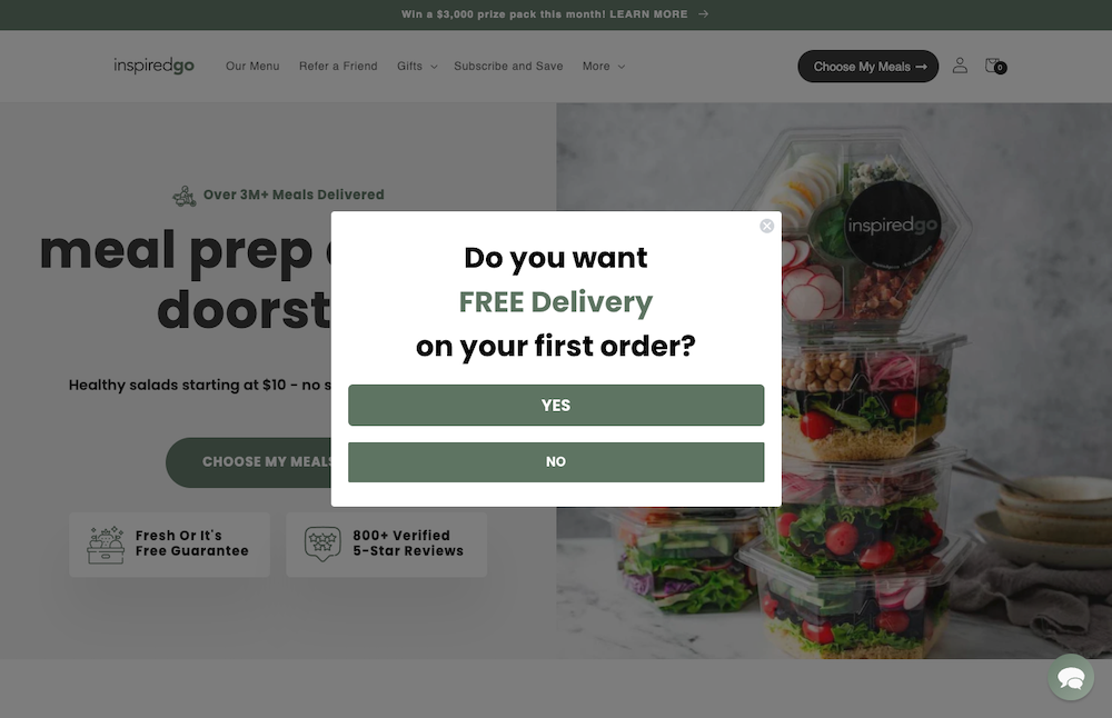InspiredGo splash page example. Pop-up includes an offer for free delivery on a first order and option to select yes or no.